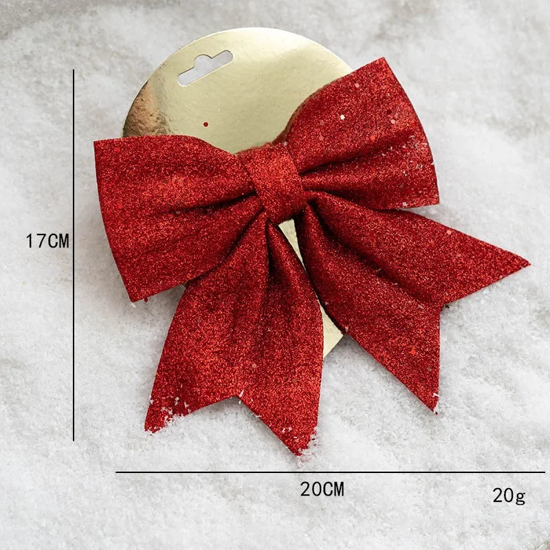 Décorations de sapin de Noël dorés avec nœuds