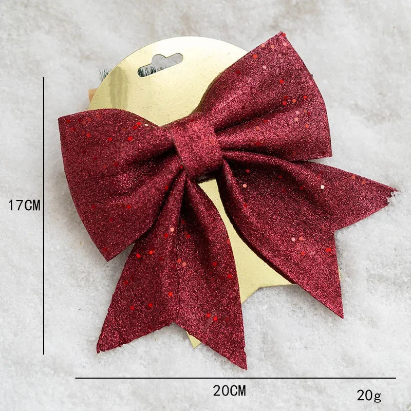 Décorations de sapin de Noël dorés avec nœuds