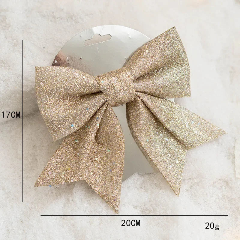 Décorations de sapin de Noël dorés avec nœuds