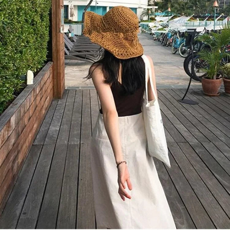 Chapeau de plage, chapeau de paille de plage d'été pour femmes, chapeau de soleil à grand avant-toit évidé à la main, chapeau de soleil pliant d'extérieur artistique et frais