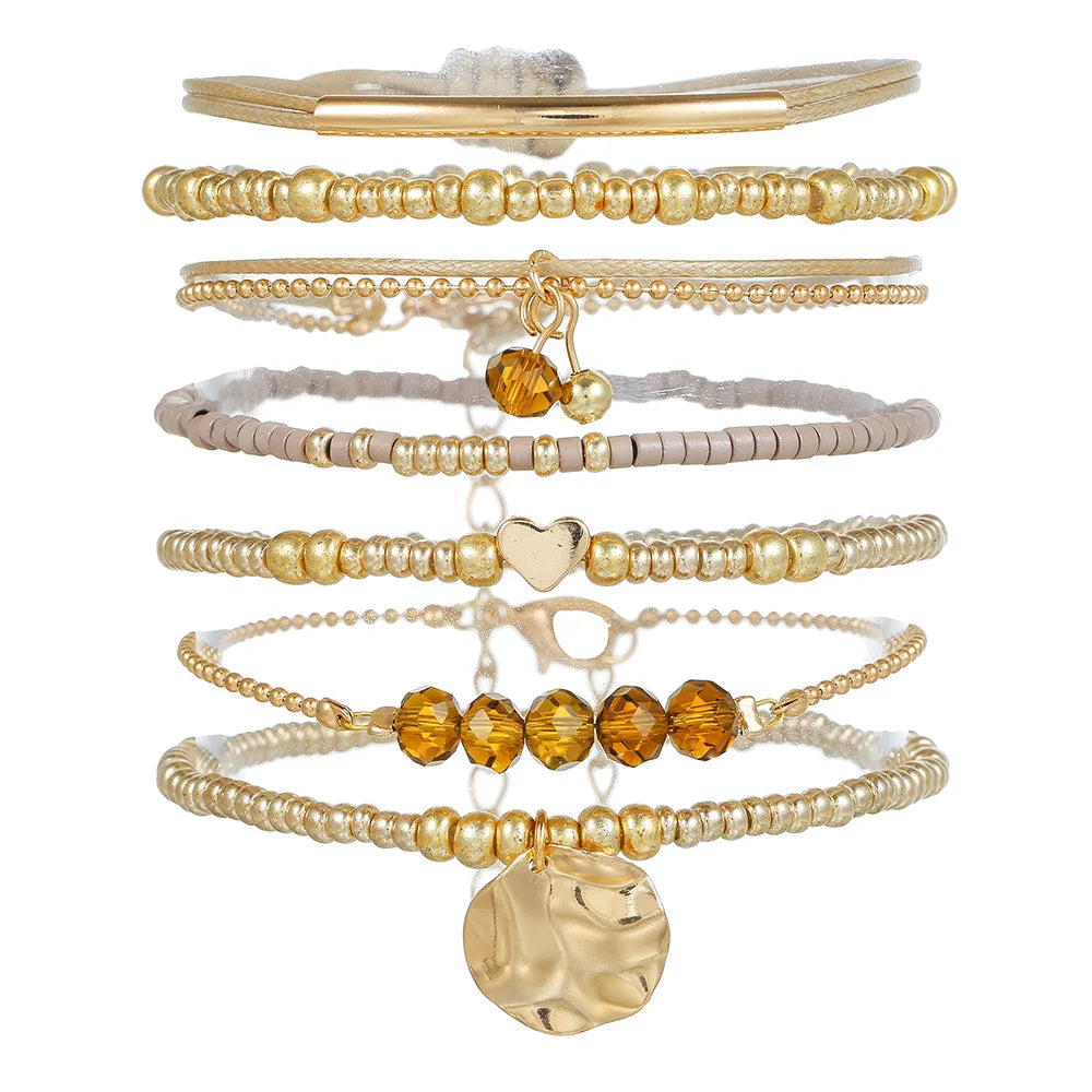 Ensemble de sept pièces de perles de style vacances bohème, bracelet de perles beiges, nouveau style de bijoux pour femmes, bracelet d'usure superposé de style ethnique