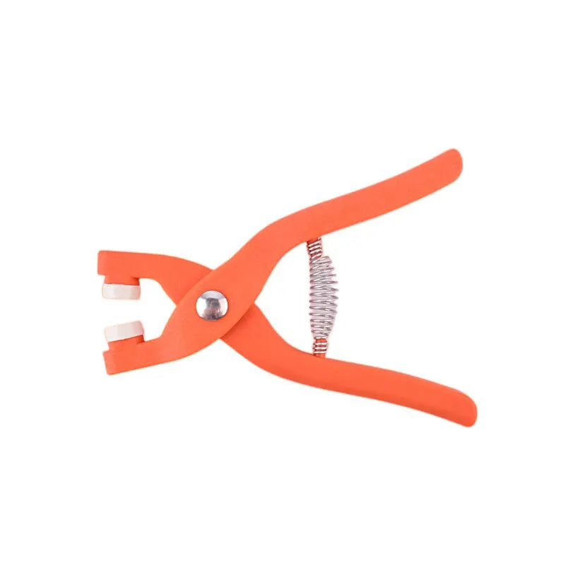 Kit professionnel de 50 boutons-pression métalliques accompagné d'une pince manuelle ergonomique pour une fixation précise et fiable