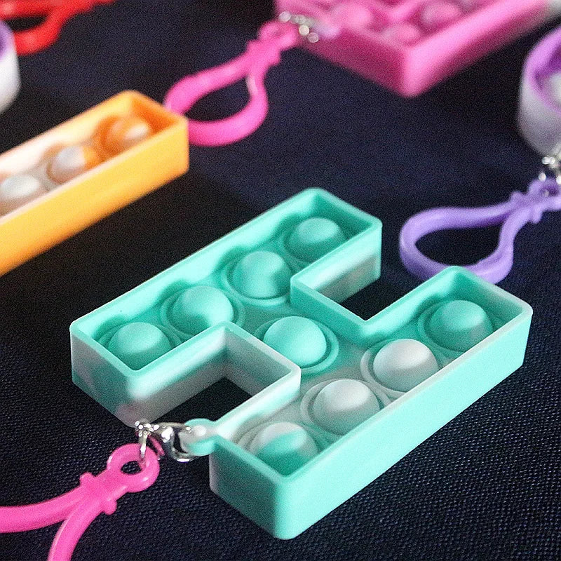 Porte-clés fidget Effosola, accessoire anti-stress innovant et engageant