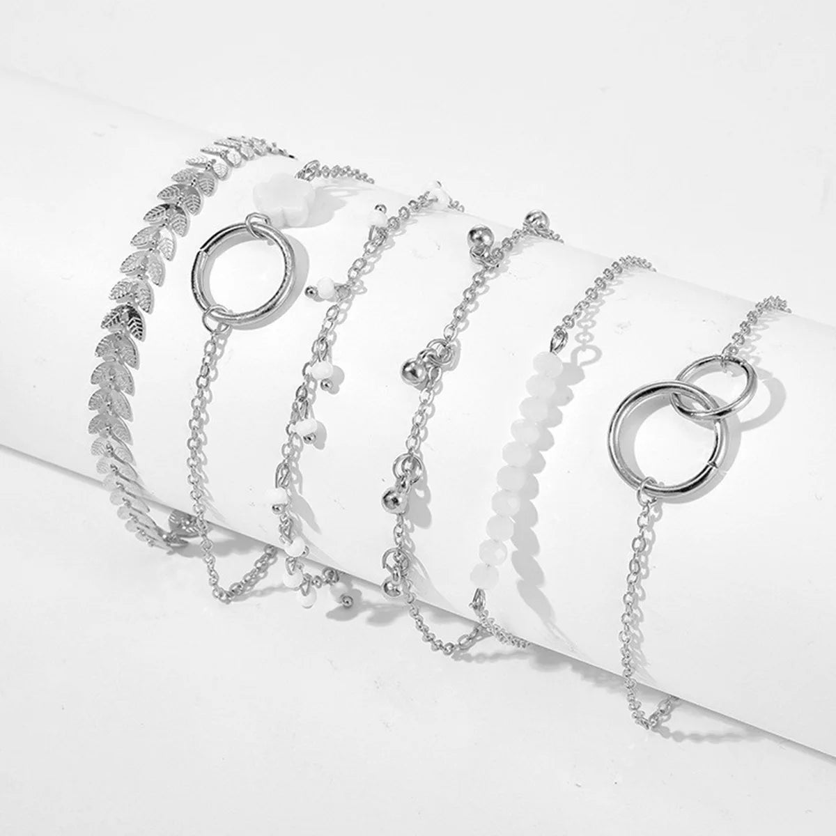 Ensemble de bracelets empilables tendance 6 pièces avec motif géométrique réglable et pompon – Parfait pour les occasions quotidiennes et spéciales.