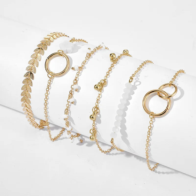 Ensemble de bracelets empilables tendance 6 pièces avec motif géométrique réglable et pompon – Parfait pour les occasions quotidiennes et spéciales.